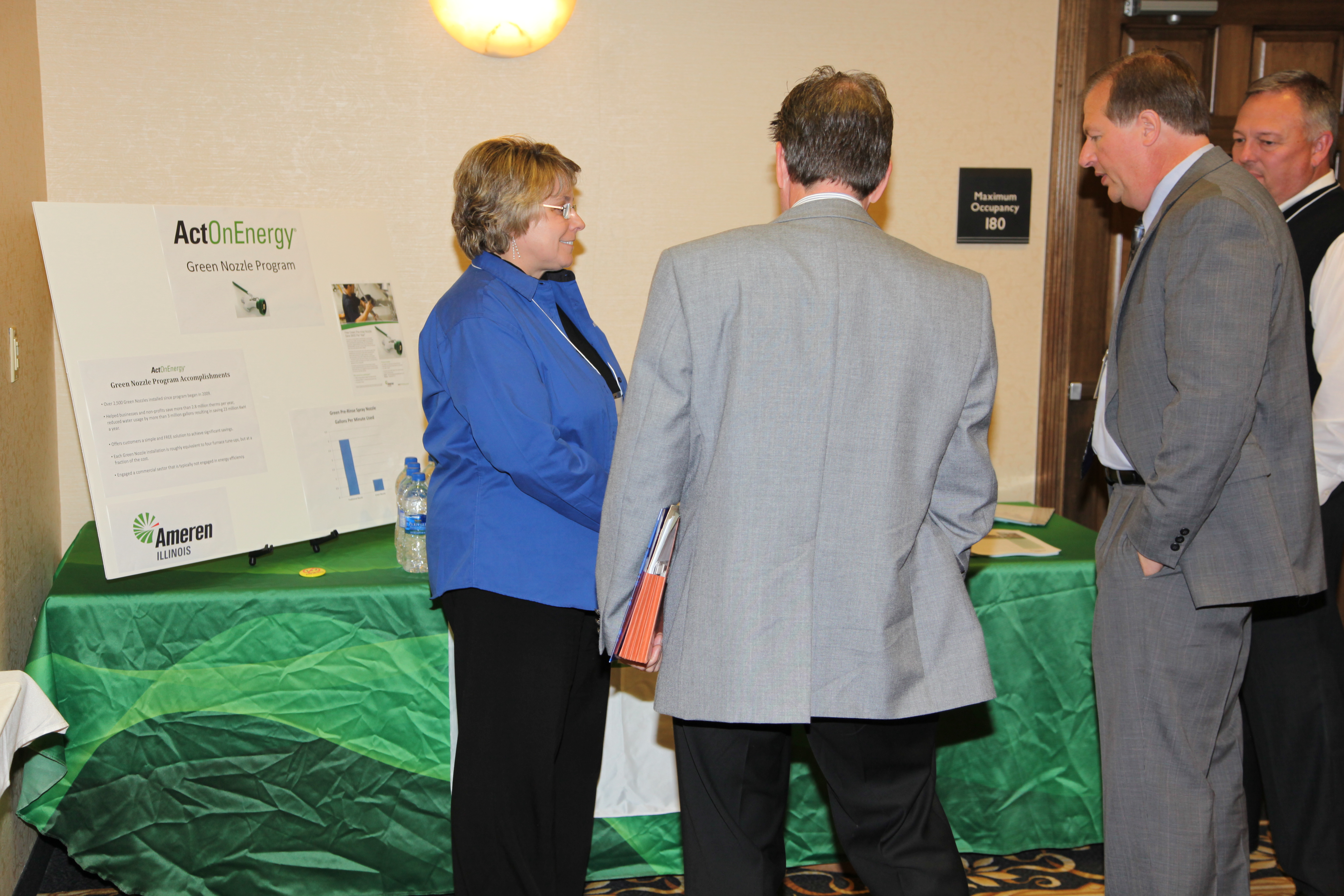 Exhibitors talk during Gov. Awards event Exhibitors talk during Gov. Awards event