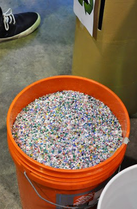 10 gallon bucket filled with multi colored shredded plastic 10 gallon bucket filled with multi colored shredded plastic